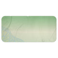 A rectangular bath mat with rounded corners featuring a pastel gradient background of green, pink, and purple, decorated with butterfly wing patterns in the bottom corners.
