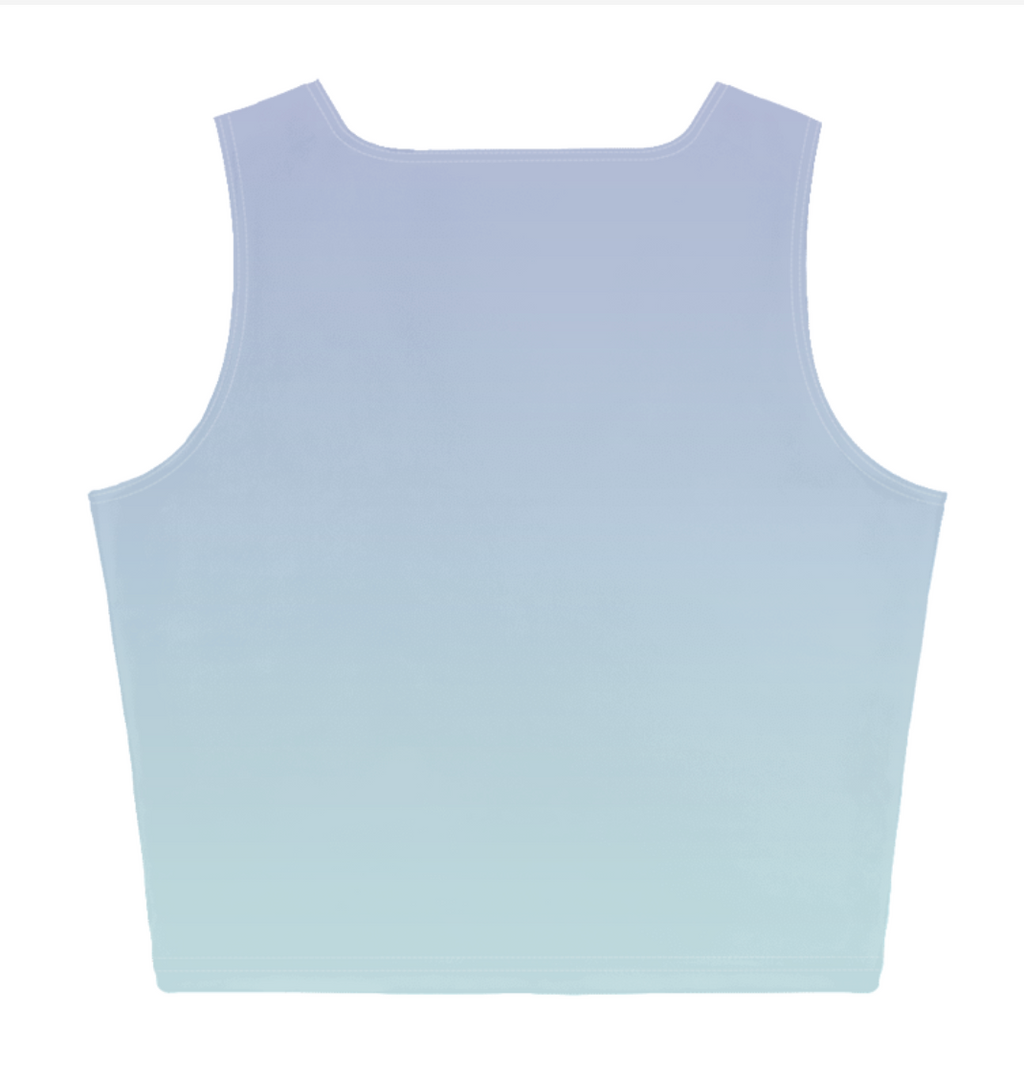 A sleeveless crop top with a scoop neck, featuring a smooth vertical gradient that transitions from a light periwinkle blue at the top to a soft mint green at the bottom, displayed on a solid white background.