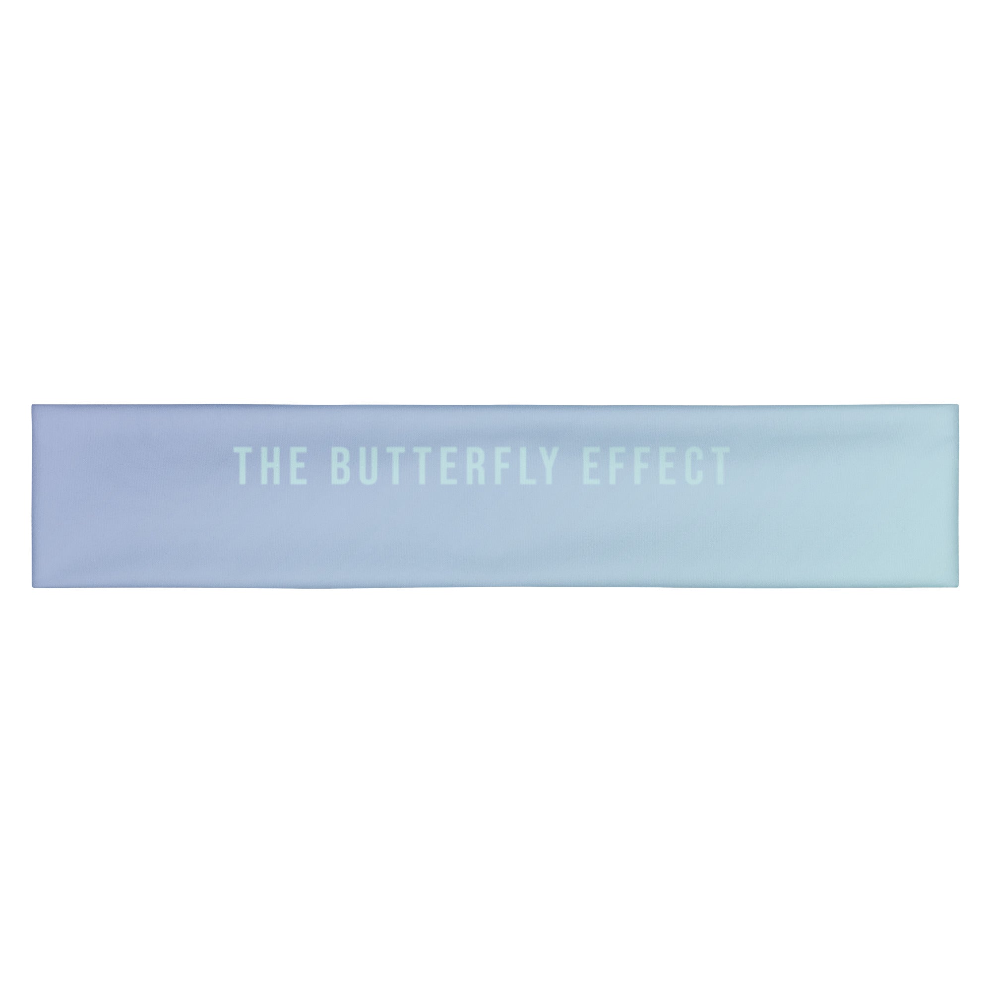 A rectangular fabric bandana or scarf in a light blue to lavender-purple gradient, featuring the text 'THE BUTTERFLY EFFECT' printed in a matching pale blue tone across the center, set against a plain white background.