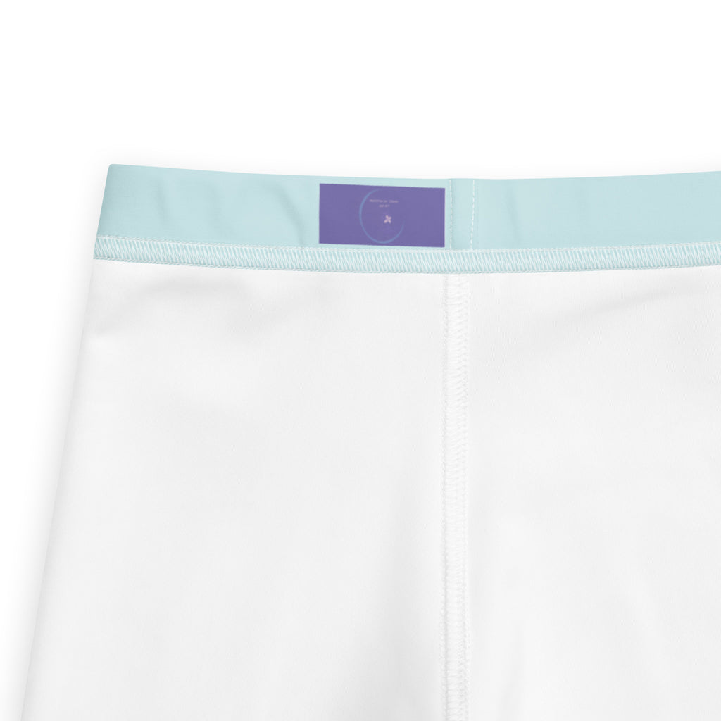 Close-up of white underwear or boxer briefs showing the waistband, with a light blue elastic band and a small purple rectangular label at the center back.