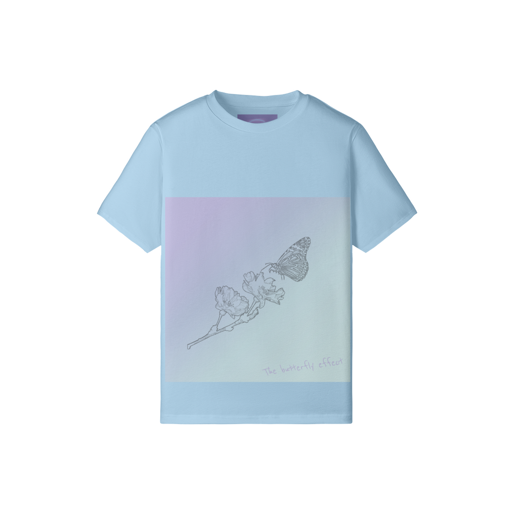 A light blue short-sleeve t-shirt with a central pastel gradient panel showing a line art sketch of a butterfly on a flower. The text 'the butterfly effect' is printed in a small cursive font near the bottom right of the panel.